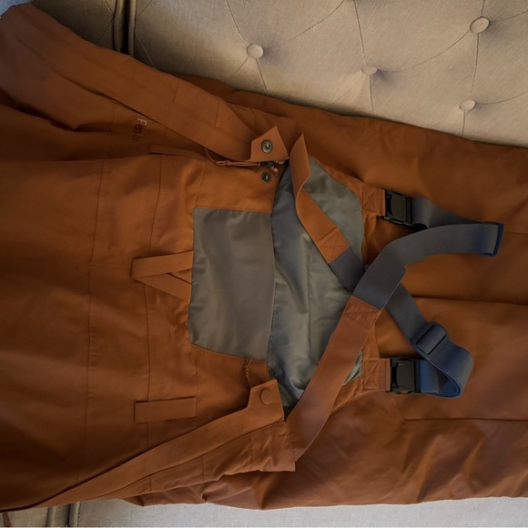 REI Pants - REI bib snow pants 
New w/ out tags